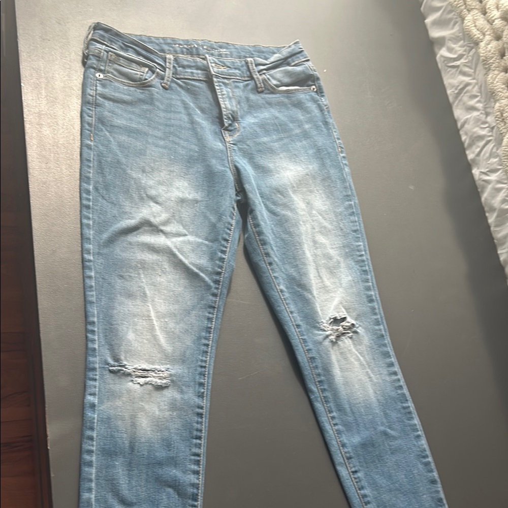 Women's Light Blue Distressed Jeans